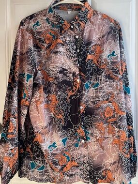 Women's Printed Button-Up Skirt in Black and Orange. 65% Cotton 35% Polyester